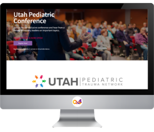 Desktop computer displaying the Conferences page of the Utah Pediatric Trauma Network website